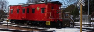 Caboose X-3115 with Christmas lights and wreaths and a dusting of snow on 1-7-2017